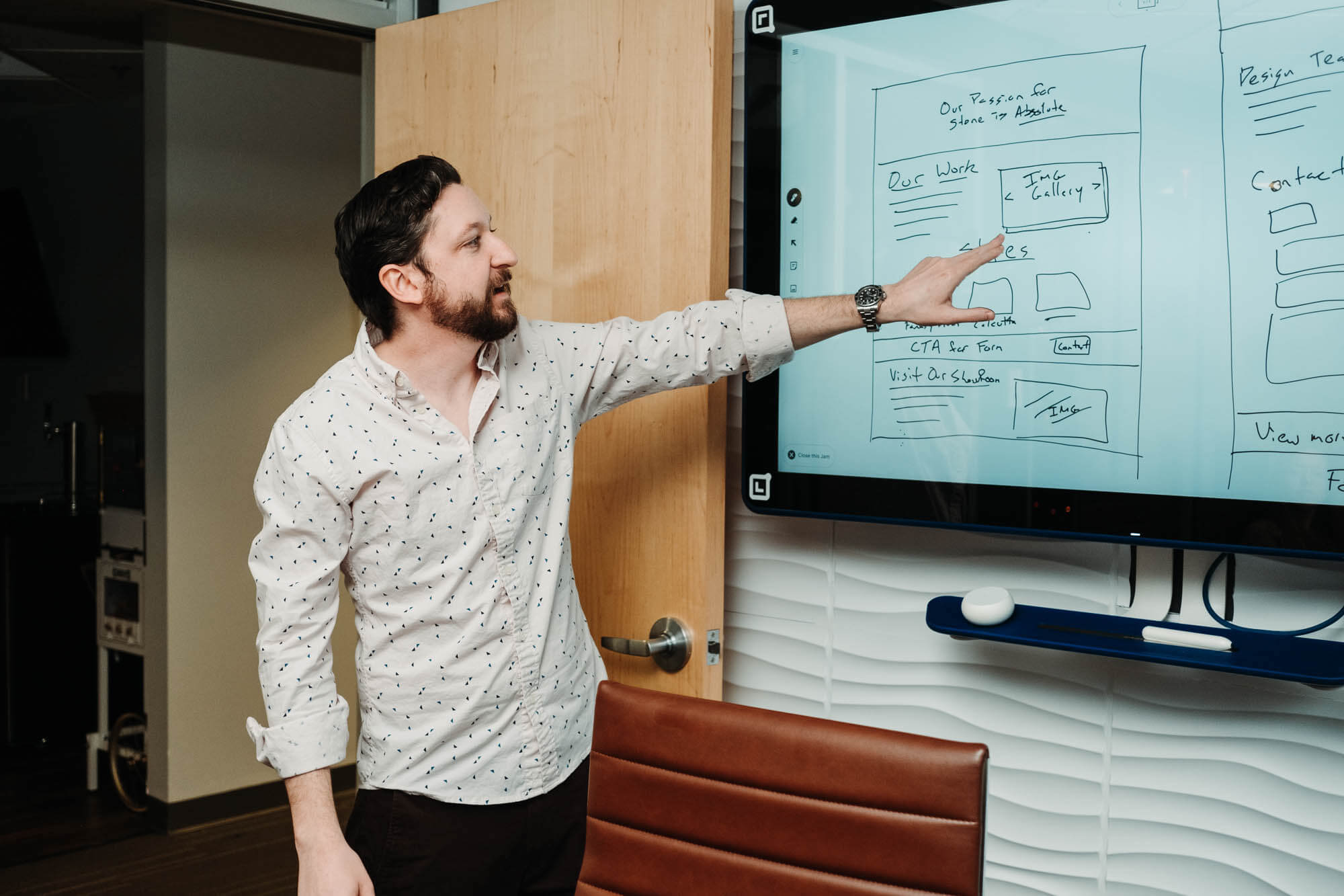 Our CEO James, talking through a site wireframe for a client