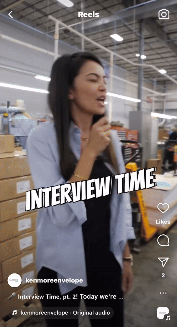Gif of a printing employee answering a question about how long he's worked for the company with a microphone
